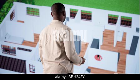 Architect Using CAD Software To Design A Real Estate Project. Stock Photo