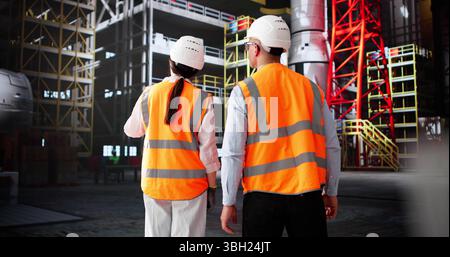Engineering Team Working Together To Design And Build Rockets At Factory Stock Photo