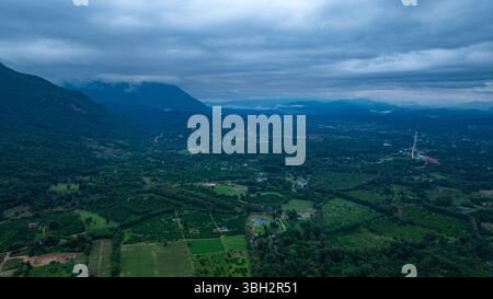 Mountain peak shrouded in thick fog Stock Photo - Alamy