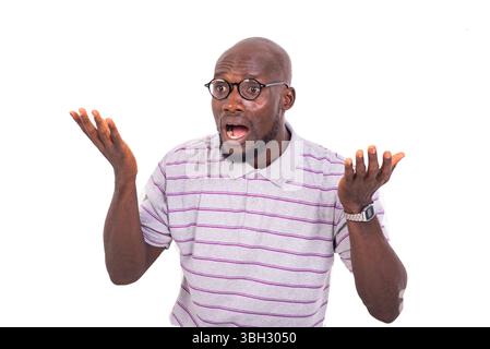 young business man wearing optical glasses, surprised talking while gesturing his hands. Stock Photo