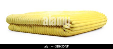 Folded yellow woolen blanket isolated on white Stock Photo
