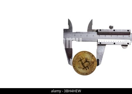 Digital currency physical golden bitcoin coin and vernier caliper. Isolated on white background Stock Photo