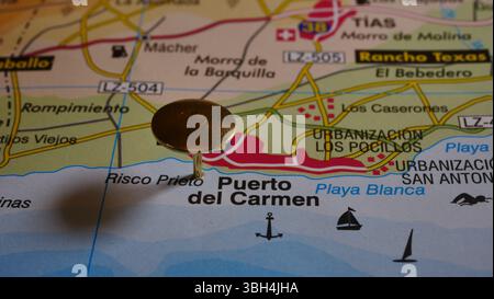 A map of Puerto del Carmen, Lanzarote, with a golden pin inserted to indicate it is an attraction worth visiting Stock Photo