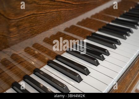 Vintage piano keyboard. Old view of piano keyboard with shallow depth of field Stock Photo