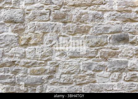 Texture of wall. Medieval wall made from bumpy stones Stock Photo