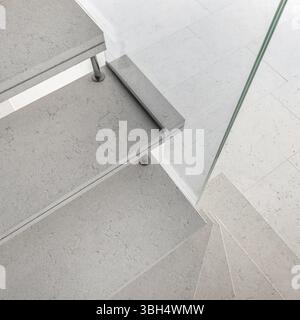 Microcement Railing Microcement stairs with glass handrail. Stairs viewed from above ...