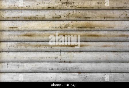 Background of white grunge metallic roller shutter door Stock Photo