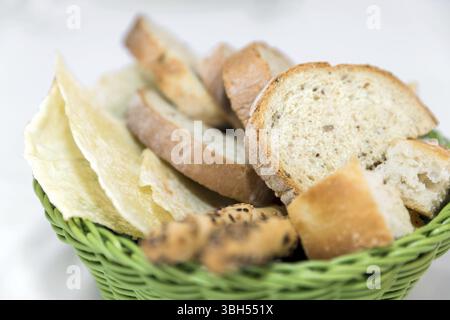 Wicker basket with assorted baking products. Shallow DOF Stock Photo