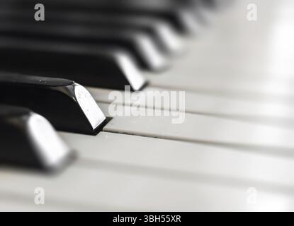 Piano keyboard background with selective focus. Space for text Stock Photo