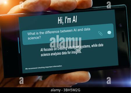 Question for AI on tablet screen. What is the difference between. AI and data science? Stock Photo