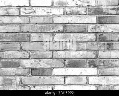 Monochrome abstract brick wall. Distressed wall with broken bricks texture. Retro house facade Stock Photo