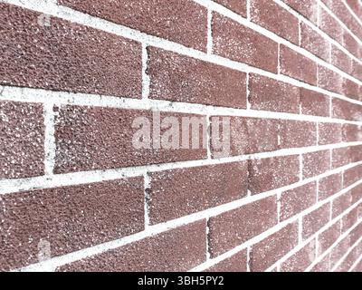 Close up of brick wall ending in infinity. Brick background selective focus. Perspective view. Shallow dof Stock Photo