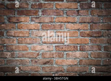 Orange old worn brick wall texture background. Vintage effect Stock Photo