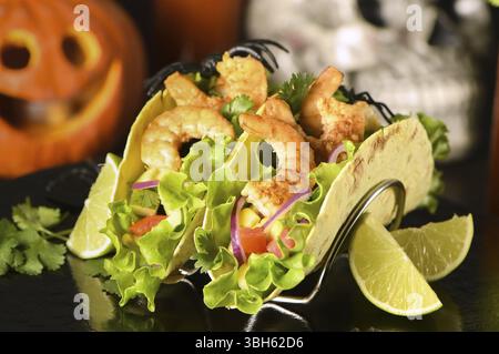 Festive serving of Crispy Fried Shrimp Tacos for Halloween Stock Photo