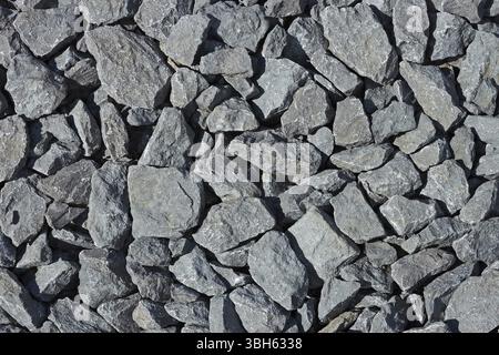 Many grayish scree stones as a background Stock Photo