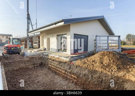 Excavation works for the installation of a swimming pool. Swimming pool under construction Stock Photo