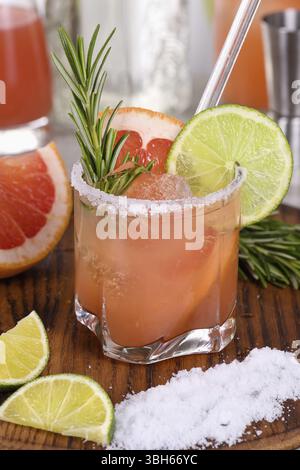 Cocktail Pink Paloma, prepared from the juice of freshly squeezed red grapefruit, lime, silver tequila. Refreshing organic cocktail Stock Photo