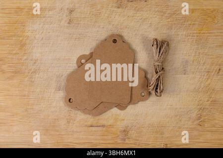 Blank Rustic Style Mockup Tags on Wooden Background Stock Photo