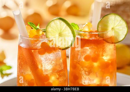 Cold bubble tea with sour fruits and balls with ice. Summer and cold ...