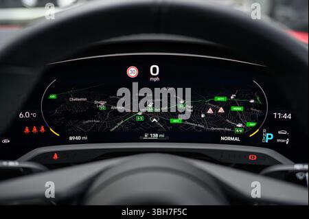 Virtual Cockpit, Digital Dashboard Displaying Map in Front of the Steering Wheel Including a Speedometer Stock Photo