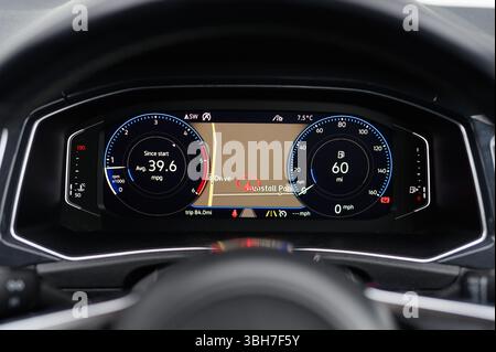 Virtual Cockpit, Digital Dashboard Displaying Map and Information About a Vehicle in Front of the Steering Wheel Including a Speedometer, Dials, Navig Stock Photo