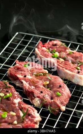 Fresh veal steak on charcoal grill. Stock Photo