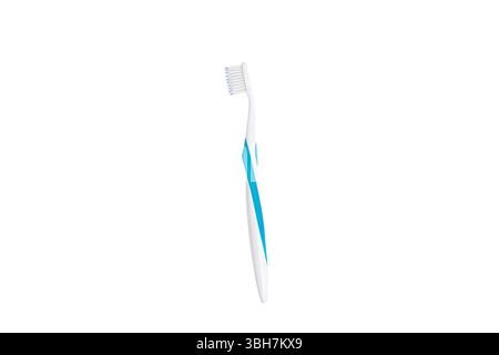 A modern toothbrush with a sleek white and blue design with transparent background. Its ergonomic handle ensures a comfortable grip,  effective cleani Stock Photo