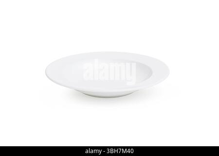A minimalist white ceramic plate with a deep center, ideal for serving pasta, soup, or salads isolated on white background, highlighting its clean lin Stock Photo