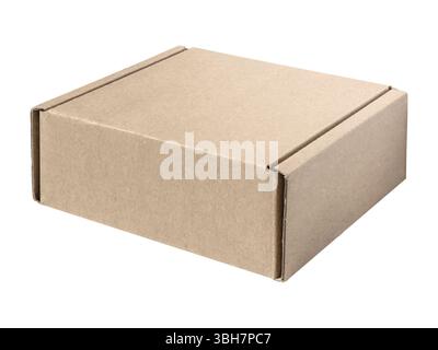 Closed, blank small light brown cardboard flap box resting on a white background, showcasing its simple square design and smooth texture. Isolated Stock Photo