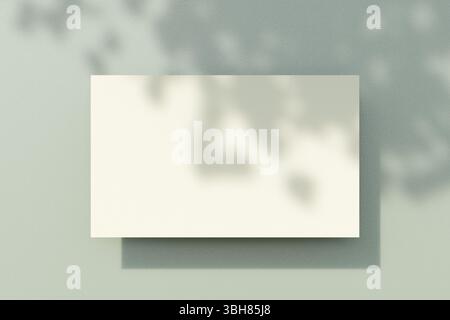 A blank card casting a delicate shadow on a textured, lightcolored surface. 3d rendering Stock Photo