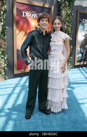 Actor Mason Thames and actress Nico Parker attend the Premiere of "How