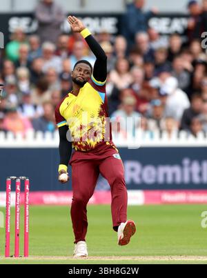 Romario Shepherd of the West Indies bowling during the Third CG United