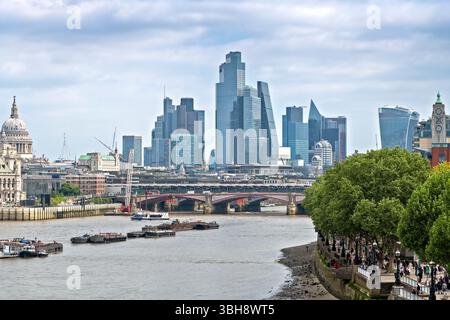 London, England, UK - May 3, 2025:  Scenic city of London skyscrapers, Blackfriars Bridge and Saint Paul's Cathedral, in London, UK. Stock Photo