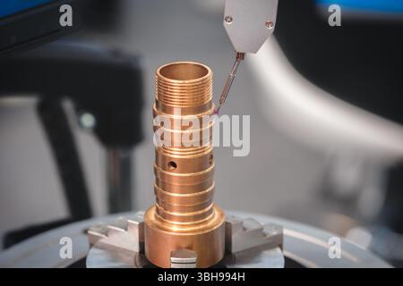 Quality control on milling metal CNC machine, coordinate measuring machine, CMM Quality control machine, technology concept Stock Photo