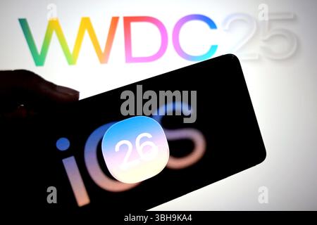 India. 6th June, 2025. In this photo illustration, an Apple IOS 26 Logo is seen displayed on a smartphone with a WWDC 2025 logo in the background. (Credit Image: © Avishek Das/SOPA Images via ZUMA Press Wire) EDITORIAL USAGE ONLY! Not for Commercial USAGE! Stock Photo