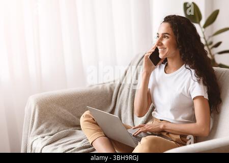 Beautiful brunette woman enjoying weekend at home Stock Photo