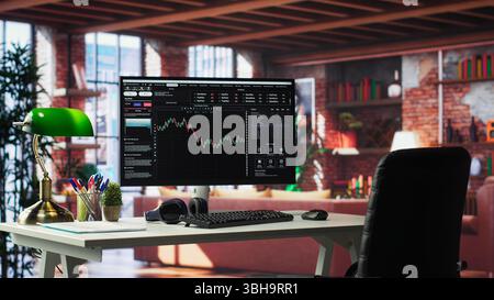 Modern home with PC monitor ready for online stock trading and forex analysis. Luxurious loft interior blending high end furniture and a computer with financial chart visualization. Stock Photo