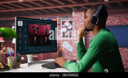 Black graphic designer working in loft with AI image generator software. Digital screen displaying visuals created through machine learning and cloud computing, generative AI. Camera B. Stock Photo