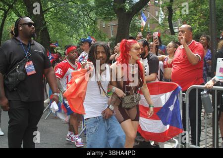 New York, USA. June 8, 2025, New York City, New York: (new) famous people at 2025 puerto rican day parade in new york. June 8, 2025, new york, usa: lil twist (with dreadlock), original name christopher lynn moore, a dallas-based rapper, justina valentine (red hair), american television host and rapper and conceited (with puerto rican jersey #13), participated in the national puerto rican day parade in new york city Credit: ZUMA Press, Inc./Alamy Live News Stock Photo