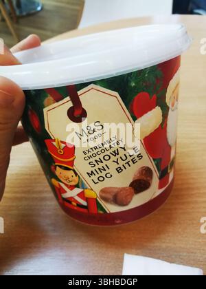 Festive Bucket of Chocolate Treats for Christmas Celebration. Horley, UK Stock Photo