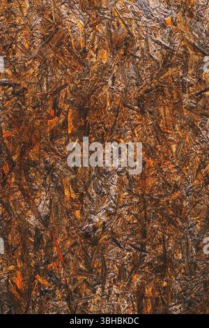 Oriented strand board (OSB) surface as background, brown painted wood, vertical image Stock Photo