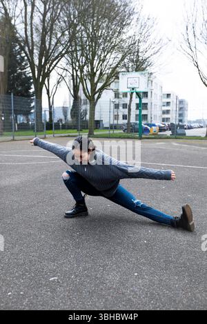 Street dancer practicing in the city. Stock Photo