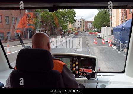 Train driver operating the Coventry VLR Very Light Rail test track, the pioneering new tram system in Coventry, 8th June 2025 Stock Photo