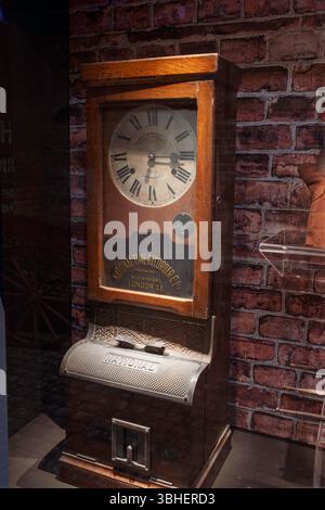 Attendance recorder or time-punch machine and time-stamped cards ...