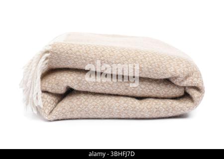 Folded beige woolen blanket isolated on white Stock Photo
