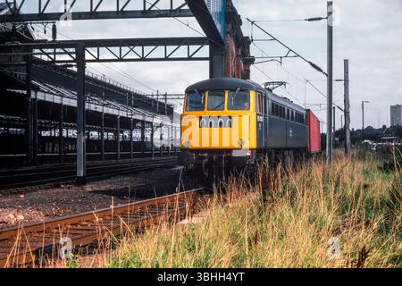 Class 85 electric locomotive hauling train from London Euston station ...