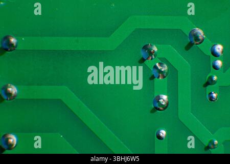 Computer circuit boards in green colors, close-up. Stock Photo
