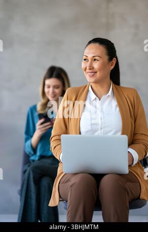 Happy professional business woman company employee, young entrepreneur smiling businesswoman working Stock Photo