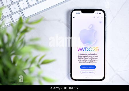 Poznan, Poland - June 10, 2025: WWDC25 on Apple iPhone displaying NEW IOS 26 with NEW Liquid Glass IN DESIGN, symbolizing innovative mobile technology Stock Photo