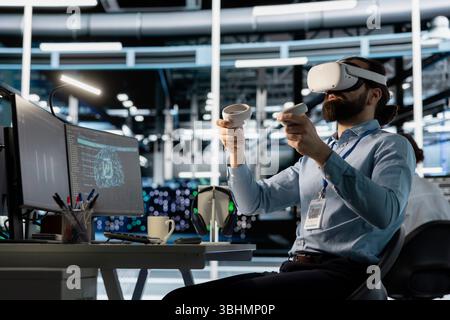 Data center engineer using virtual reality technology to visualize artificial intelligence neural networks. Server room worker using VR headset equipment to oversee AI systems Stock Photo